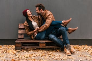 couple-in-love-sitting-on-bench.jpg