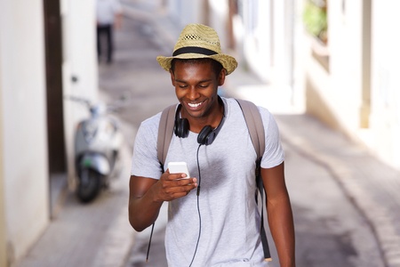 man-checking-phone-and-smiling.jpg